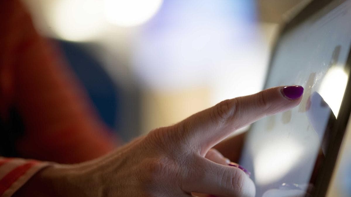 Reviewer comparing generated email against brand color swatches